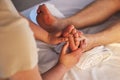 Closeup, feet and spa therapist with massage, pedicure and relax with health, wellness and acupressure service. Zoom Royalty Free Stock Photo