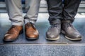 closeup on feet, standing passenger wearing casual and formal shoes side by side