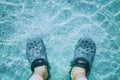 Closeup feet in the water Royalty Free Stock Photo