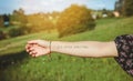 Female arm with text -I`m still waiting- written in skin Royalty Free Stock Photo