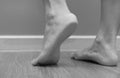 Closeup of a female foot heel pain, plantar fasciitis