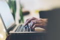 Closeup female freelancer sitting front open laptop computer with blank screen blue monitor, young business woman work on notebook