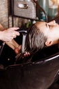 Portrait of women which wash hair in a beauty salon Royalty Free Stock Photo