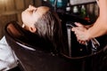 Portrait of women which wash hair in a beauty salon Royalty Free Stock Photo