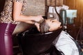 Portrait of women which wash hair in a beauty salon Royalty Free Stock Photo