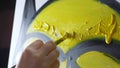 Closeup. female hand painting with a brush painting on canvas with oil paints Royalty Free Stock Photo