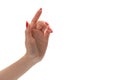 Closeup of female hand with pale skin and red nails pointing or touching isolated on a white background Royalty Free Stock Photo