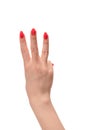 Closeup of female hand with pale skin and red nails pointing or touching isolated on a white background Royalty Free Stock Photo