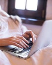 Closeup of a female hands busy typing on a laptop Royalty Free Stock Photo
