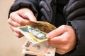 Closeup of female hands counting LEI banknotes - world money, inflation and economy concept Royalty Free Stock Photo