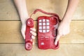 Closeup of female hands ending conversation by red Royalty Free Stock Photo