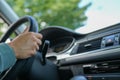Closeup of female hands holding a steering wheel Royalty Free Stock Photo