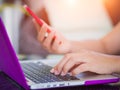 Closeup female hands typing on laptop keyboard. Royalty Free Stock Photo