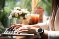 Closeup female hands typing on laptop keyboard. Woman working at home office concept Royalty Free Stock Photo