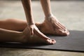 Closeup of female palms on heels, Camel pose