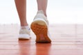 Closeup of female running walking shoes. Work out concept  step walk Royalty Free Stock Photo