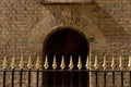 Closeup fence lances facade castle archway door Royalty Free Stock Photo