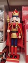 Closeup Festive Nutcracker King Decoration Standing Amidst Christmas Retail Display. Royalty Free Stock Photo