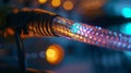 A closeup of a fiber optic cable connected to a device with lightresponsive materials embedded within the cable. As the Royalty Free Stock Photo