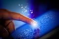 Closeup of finger touching tablet-pc screen Royalty Free Stock Photo