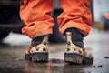 closeup of a firefighters boots and protective trousers Royalty Free Stock Photo