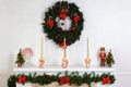 Closeup fireplace mantel with wreath Royalty Free Stock Photo