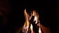 Closeup firewood burns in the fireplace in the evening Royalty Free Stock Photo