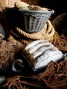 Closeup of fishing basket, lines and rope, net and storage of traditional equipment at port. Tools, fishery and mesh