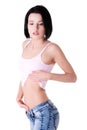 Closeup on fitness woman showing flat belly Royalty Free Stock Photo
