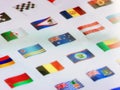 Closeup flag countries icons on computer or mobile screen