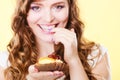 Closeup flirty woman eating fruit cake