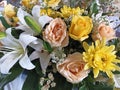 Closeup flowers bouquet background. With pastel roses, yellow chrysanthemum, and white tulips. Natural floral. Royalty Free Stock Photo