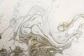 Closeup of a flowing abstract acrylic pour painting in shades of pink and white. Royalty Free Stock Photo