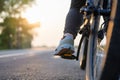 Riding bicycle on the country road at sunset Royalty Free Stock Photo