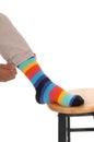 Closeup of foot with colorful socks.