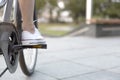 Closeup of the foot on the pedal bicycle, sport and transport. Easy city transportation Royalty Free Stock Photo