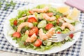 Closeup of fork with fresh shrimp and berry salad Royalty Free Stock Photo