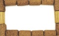 Closeup frame of wine corks on white background. Royalty Free Stock Photo