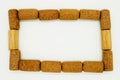 Closeup frame of wine corks on white background.