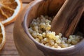 Closeup of frankincense resin in a mortar