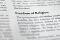 closeup of Freedom of Religion printed in textbook on white page. Royalty Free Stock Photo