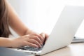 Closeup freelance asian woman working and typing on laptop computer at desk office with professional Royalty Free Stock Photo