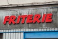 french fries fast food restaurant sign in french traduction of friterie in french chip shop in english Royalty Free Stock Photo