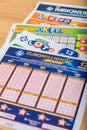 Closeup of french grids of lotto , Euromillions, Keno, Joker+ from the society FDJ La francaise des jeux