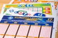 Closeup of french grids of lotto , Euromillions, Keno, Joker+ from the society FDJ La francaise des jeux