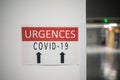 french hospital emergency CoVID-19 entry sign with text in french urgences COVID-19