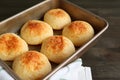 Fresh Baked Homemade Brazilian Cheese Bread or Pao de Queijo in the Baking Tray Royalty Free Stock Photo