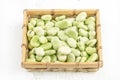 Closeup fresh broad bean seeds on a wooden table Royalty Free Stock Photo