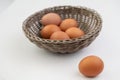 Closeup of fresh brown eggs in Easter basket Royalty Free Stock Photo