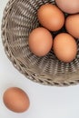 Closeup of fresh brown eggs in Easter basket Royalty Free Stock Photo